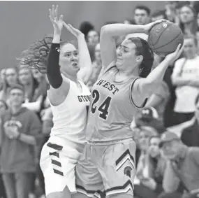  ?? CURT HOGG / NOW NEWS GROUP ?? West Bend West guard Isabella Baker (24) helped the Spartans pick up victories over Hartford and Port Washington last week.