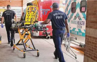  ?? Elizabeth Conley/Staff file photo ?? Paramedics work at Ben Taub Hospital. Reaching out to survivors of violence is a priority.