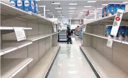  ?? NAM Y. HUH/AP ?? Shelves in the toilet paper aisle at a Target store sit empty in Vernon Hills, Ill., this month.