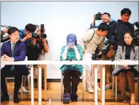  ?? PHOTO: REUTERS ?? Ador chief ececutive Min Hee-jin, center, attends a news conference in Seoul on Thursday.