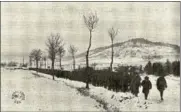  ??  ?? Soldiers of the 117th Field Signal Battalion of the 42nd Division make their way through the snowy French countrysid­e during December 1917 in what became known as the “Valley Forge Hike”.