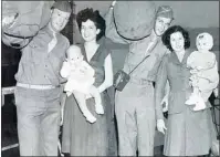  ?? Photograph submitted ?? Fathers leaving for World War II say ‘good-bye’ to wives and children.
