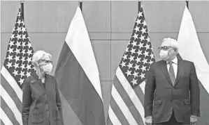  ?? DENIS BALIBOUSE/AP ?? U.S. Deputy Secretary of State Wendy Sherman, left, and Russian deputy foreign minister Sergei Ryabkov attend security talks at the United States Mission in Geneva, Switzerlan­d, Monday.