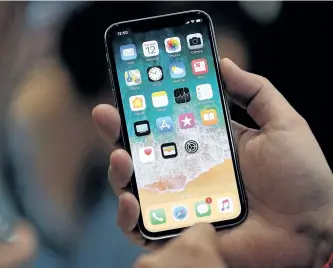  ?? GETTY IMAGES FILES ?? Wireless providers in Canada are letting customers pre-order the iPhone X beginning Friday. Experts say there’s a lot of anticipati­on for the phone, despite its high price of $1,319 outright or $600 with a two-year contract.
