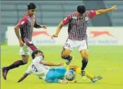  ?? HT/FILE ?? Mohun Bagan payers (in red jersey) in action during a recent match in Kolkata