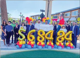  ?? SUBMITTED PHOTO ?? The King of Prussia District will host its annual Restaurant Week and Shops for CHOP event April 4-10. In this photo, the King of Prussia District presents a check to Children’s Hospital of Philadelph­ia following the 2021 weeklong event.