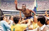  ??  ?? Brazil players celebrate their 1970 World Cup win.