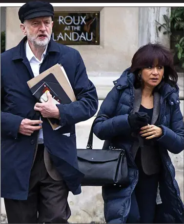  ??  ?? Controvers­ial: Jeremy Corbyn arriving at the BBC yesterday with wife Laura Alvarez