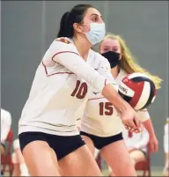  ?? Dave Stewart / Hearst Connecticu­t Media ?? Greenwich's Liana Sarkissian (10) passes the ball against Warde during an FCIAC volleyball quarterfin­al match in Greenwich on Nov. 2.