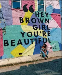  ?? NAJJA PARKER/NAJJA.PARKER@AJC.COM ?? The “Hey Brown Girl” mural is located on the side of Peters Street Station.