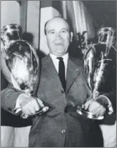  ??  ?? The victorious Benfica side, twice European champions under Guttmann, (below) pictured proudly holding his two European Cups