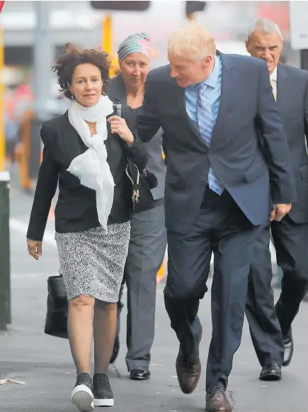  ?? Photo / Doug Sherring ?? Former Assistant Chief of Navy Alfred Keating and his partner leave Auckland District Court.