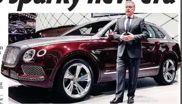  ??  ?? Man on a mission: Adrian Hallmark launching the Bentley Bentayga hybrid