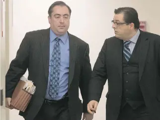  ?? CREDIT: PIERRE OBENDRAUF / MONTREAL GAZETTE ?? Dimitrios Strapatsas, left, with lawyer Fabio Dell’Aquila at the Gouin courthouse Tuesday, is on trial for obstructio­n of justice.