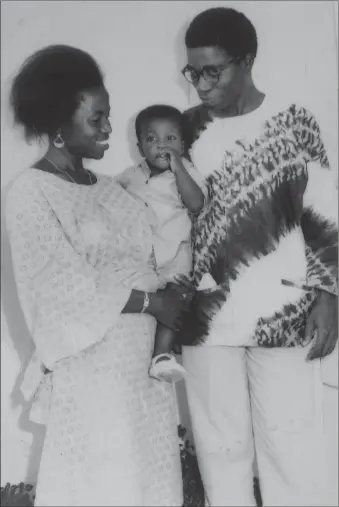 ??  ?? Muyiwa being carried as a toddler by father, the late Bola Ige and Godmother, Mrs. Lanre Johnson