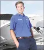  ?? Arnold Gold / Hearst Connecticu­t Media ?? Atlantic Outboard sales manager Evan Cusson by some of their remaining boats at the Westbrook business on Friday.