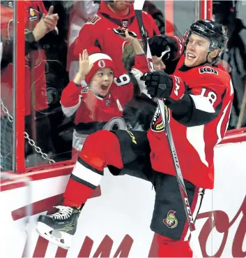  ?? FRED CHARTRAND/ THE CANADIAN PRESS ?? Ottawa’s Ryan Dzingel celebrates his goal during the Senators’ 6- 5 overtime win over the San Jose Sharks last Friday in Ottawa.