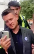  ??  ?? Filming: Tommy Robinson being arrested on Friday