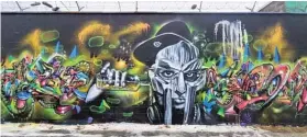  ?? PROVIDED ?? Uptown-raised artist James Spurgeon incorporat­ed graffiti “wildstyle,” cubism and abstract influences in his mural of the late rapper and hip-hop artist MF DOOM.