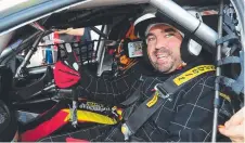  ?? Picture: SCOTT RADFORD- CHISHOLM ?? LET’S GO: Townsville Bulletin his hot lap yesterday.sports editor Dale Fletcher ready for