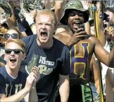  ?? Matt Freed/Post-Gazette ?? Pitt fans cheer on the Panthers against Penn State, one of the few teams to bring a sellout crowd to Heinz Field in the past few years.