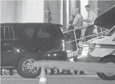  ?? SAM GREENE, THE CINCINNATI ENQUIRER ?? Otto Warmbier, a U. S. college student who was imprisoned in North Korea, is carried off a plane Tuesday at Lunken Airport.