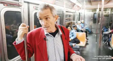  ??  ?? McLachlan inside the subway car (AFP photo)