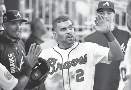  ?? 2017 PHOTO BY TODD KIRKLAND/ GETTY IMAGES ?? Micah Johnson says of his pro baseball career: “I was a small- ball guy. I couldn’t hit home runs. I couldn’t change the game. It got depressing. So I got out.”