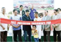  ??  ?? Former Philracom Chairman Atty. Jose Ferdinand M. Rojas II, 3rd left, congratula­tes winning jockey Pat Dilema after his horse Salt and Pepper ruled the Philracom Chairman's Cup at the Saddle and Clubs Leisure Park in Naic, Cavite Sunday. They are...