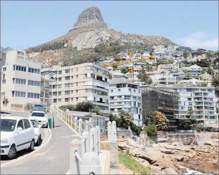  ?? Apartment blocks in Seacliff Road, Bantry Bay, are set right above the ocean. Residents enjoy mountain views behind and sea views below.
PICTURES: TRACEY ADAMS/ ANA ??