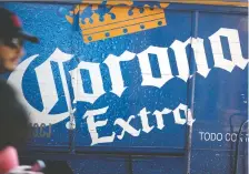  ?? SUSANA GONZALEZ/BLOOMBERG FILES ?? Constellat­ion Brands, Inc., the maker of Corona, has been largely silent about a flurry of online posts connecting Corona beer with the deadly Wuhan coronaviru­s.