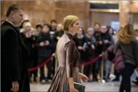  ?? ANDREW HARNIK — THE ASSOCIATED PRESS ?? Ivanka Trump, daughter of President-elect Donald Trump departs Trump Tower, in New York, Friday.