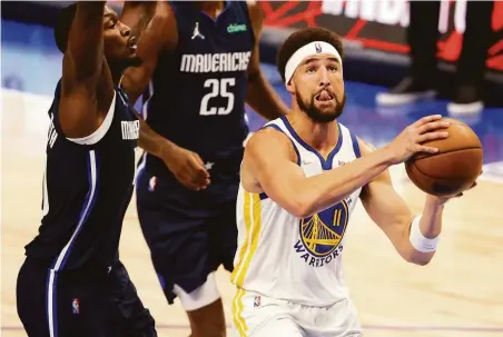  ?? Photos by Scott Strazzante / The Chronicle ?? Klay Thompson, who finished with 19 points in Game 3, said the Warriors’ hot first quarter “propelled” them to victory.