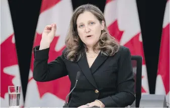  ?? ADRIAN WYLD, THE CANADIAN PRESS ?? Minister of Finance Chrystia Freeland responds to a question during a news conference on Feb. 27 in Ottawa. A report commission­ed by the Canadian Lenders Associatio­n estimates that a plan to lower the maximum interest rate could lead to the loss of tens of thousands of jobs and billions of dollars in GDP.