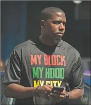  ?? (Courtesy Photo/Colin Boyle) ?? Jahmal Cole, founder of My Block, My Hood, My City, participat­es during a June 7 peace march and food giveaway organized by his nonprofit group in Chicago. “I feel there’s ways we can resist constructi­vely,” he says.