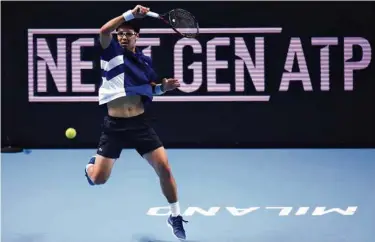  ?? (MARCO BERTORELLO/AFP) ?? Le Sud-Coréen Hyeon Chung (59e rang mondial), victorieux au Next Gen Finals, à Milan, a empoché 390 000 dollars.