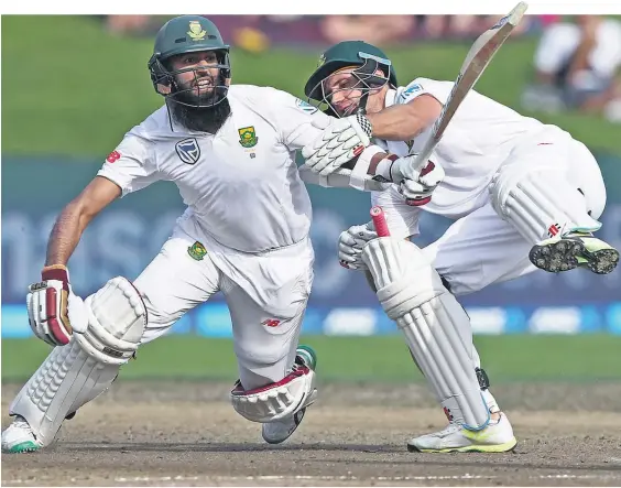  ?? Picture / Getty Images ?? South African batsmen Hashim Amla (left) and Theunis de Bruyn collide mid-pitch during a botched single yesterday.