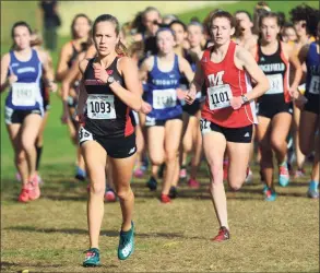  ?? Christian Abraham, Hearst Connecticu­t Media / Hearst Connecticu­t Media ?? Greenwich’s Mari Noble leads the pack during the Class LL cross country championsh­ip in 2019.