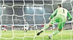  ?? - AFP photo ?? Manchester City’s Sergio Aguero sends West Ham goalkeeper Lukasz Fabianksi the wrong way from the penalty spot to score the only goal of the champions’ 1-0 win in the Premier League at the Etihad Stadium.