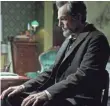  ?? DREAMWORKS PICTURES/20TH CENTURY FOX ?? Daniel Day-Lewis gets presidenti­al in 2012’s Lincoln.