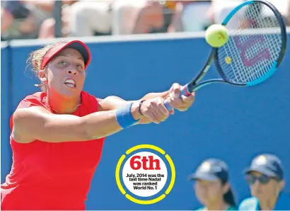  ?? AP ?? Madison Keys returns to Coco Vandeweghe during their first round match which Keys won 6-4, 3-6, 6-3. —