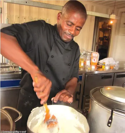  ??  ?? A houseman making a meal