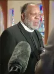  ?? ?? The Rev. Dale B. Snyder speaks to reporters at Bethel A.M.E. Church in the Hill District on Friday.