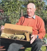  ?? Photograph: Iain Thornber. ?? Ian Mackinnon with the Comet bagpipes which his forebear rescued.