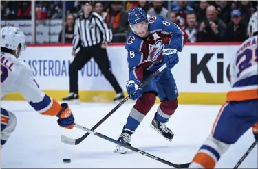  ?? AARON ONTIVEROZ — THE DENVER POST ?? Cale Makar (8) of the Colorado Avalanche passes against the New York Islanders during the first period at Ball Arena in Denver on Tuesday, Jan. 2, 2024.