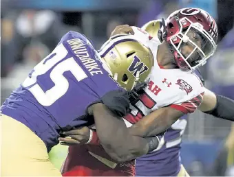  ?? Tony Avelar, The Associated Press ?? Washington defensive lineman Levi Onwuzurike (95) opted out of the 2020 season but had an impressive showing at the Senior Bowl.