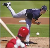  ?? Associated Press ?? DEALING
New York Yankees starting pitcher Gerrit Cole delivers to the Philadelph­ia Phillies’ Rhys Hoskins during the first inning in Clearwater, Fla., on Thursday.