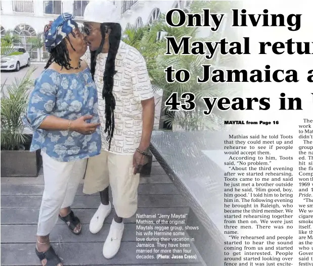  ?? (Photo: Jason Cross) ?? Nathaniel “Jerry Maytal” Mathias, of the original Maytals reggae group, shows his wife Hermine some love during their vacation in Jamaica. They have been married for more than four decades.