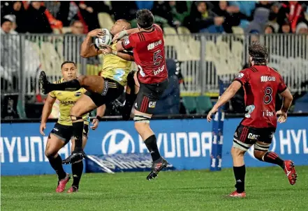  ?? AP ?? Hurricanes wing Julian Savea, seen here in action against the Crusaders, can expect plenty of high ball from Highlander­s’ Lima Sopoaga and Aaron Smith this week.