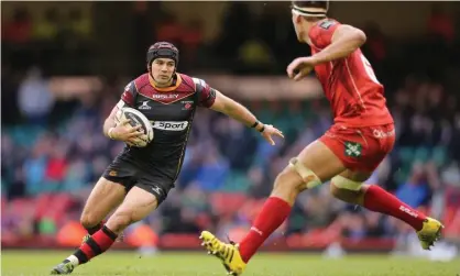  ?? Photograph: Huw Evans/Shuttersto­ck ?? Adam Hughes (left), pictured in action for Dragons in 2016, retired age 28 after a severe concussion.